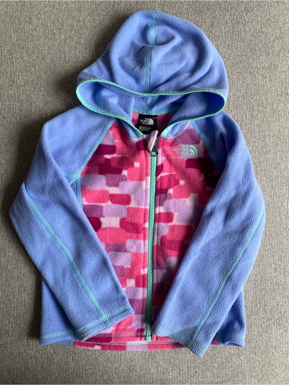The North Face Girls' Hooded Fleece Jacket in Light Blue and Pink Pattern